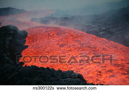 Lava flow during eruption of Mount Etna volcano, Sicily, Italy. View Large Photo Image Stock Photograph - Lava flow during eruption of Mount Etna volcano, Sicily, Italy.. Fotosearch