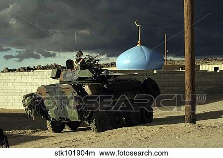 Light armored vehicle commander mans the M240G machine gun. View Large Photo Image Picture - Light armored vehicle commander mans the M240G machine gun.. Fotosearch