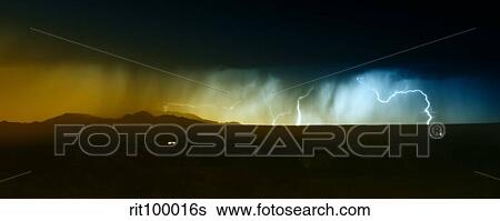 Stock Photograph - Lightning storm over northern New Mexico plains.. Fotosearch