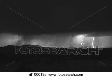 Stock Photograph - Lightning storm over northern New Mexico plains.. Fotosearch
