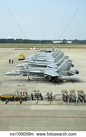 Line-up of F/A-18 Hornets on the ramp at Naval Air Station Oceana, Virginia. View Large Photo Image Picture - Line-up of F/A-18 Hornets on the ramp at Naval Air Station Oceana, Virginia.. Fotosearch