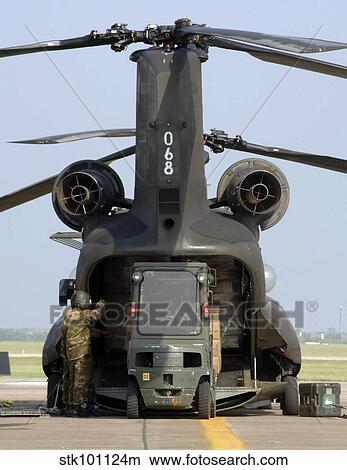Loading of relief supplies into a CH-47 Chinook. View Large Photo Image Picture - Loading of relief supplies into a CH-47 Chinook.. Fotosearch