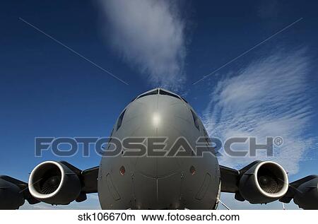 Low angle view of a C-17 Globemaster III. View Large Photo Image Picture - Low angle view of a C-17 Globemaster III.. Fotosearch