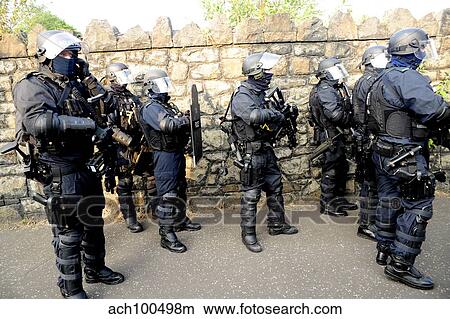 Loyalist protesters attack police lines at the Albertbridge Road in Belfast, Northern Ireland. View Large Photo Image Picture - Loyalist protesters attack police lines at the Albertbridge Road in Belfast, Northern Ireland.. Fotosearch