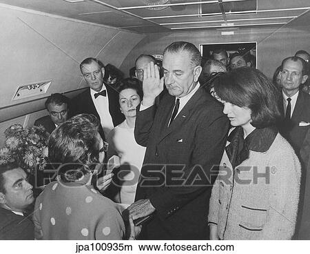 Lyndon Johnson taking the Presidential Oath of Office. View Large Photo Image Picture - Lyndon Johnson taking the Presidential Oath of Office.. Fotosearch