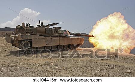 Marines bombard through a live fire range using M1A1 Abrams tanks. View Large Photo Image Picture - Marines bombard through a live fire range using M1A1 Abrams tanks.. Fotosearch