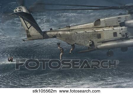 Marines conduct insertion exercises from a CH-53E Super Stallion. View Large Photo Image Picture - Marines conduct insertion exercises from a CH-53E Super Stallion.. Fotosearch