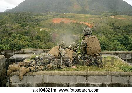 Picture - Marines engage unknown-distance targets at Camp Schwab, Japan.. Fotosearch