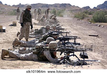 Picture - Marines fire their M240G medium machine guns and M249 squad automatic weapons.. Fotosearch