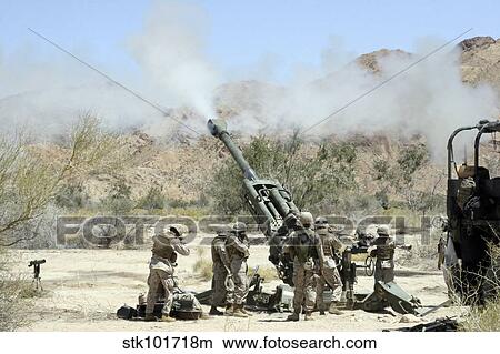 Marines shoot 100-pound rounds from their M777 Lightweight Howitzer. View Large Photo Image Picture - Marines shoot 100-pound rounds from their M777 Lightweight Howitzer.. Fotosearch
