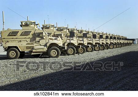 MaxxPro Mine Resistant Ambush Protected vehicles sit at Camp Liberty. View Large Photo Image Picture - MaxxPro Mine Resistant Ambush Protected vehicles sit at Camp Liberty.. Fotosearch