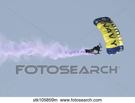 Picture - Member of the U. S. Navy parachute demonstration team.. Fotosearch