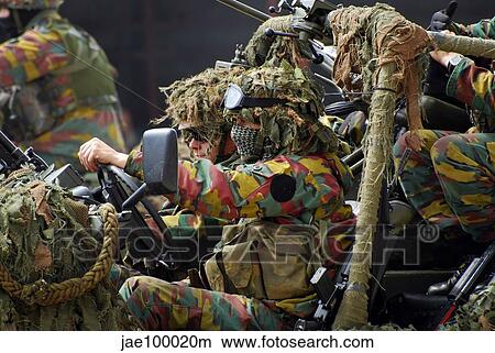 Members of a recce or scout team of the Belgian Army. View Large Photo Image Picture - Members of a recce or scout team of the Belgian Army.. Fotosearch