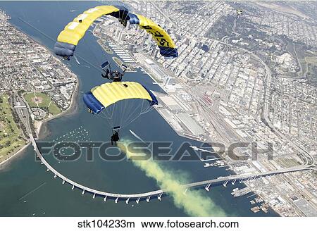 Members of the U. S. Navy parachute team above Naval Amphibious Base Coronado. View Large Photo Image Picture - Members of the U. S. Navy parachute team above Naval Amphibious Base Coronado.. Fotosearch