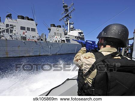 Members of the visit, board, search and seizure team alongside USS Porter. View Large Photo Image Picture - Members of the visit, board, search and seizure team alongside USS Porter.. Fotosearch