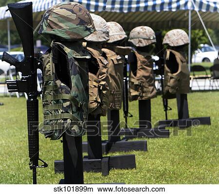 Memorials of flak jackets and protective helmets. View Large Photo Image Picture - Memorials of flak jackets and protective helmets.. Fotosearch