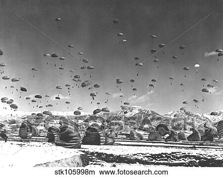 Men and equipment being parachuted over Korea. View Large Photo Image Picture - Men and equipment being parachuted over Korea.. Fotosearch