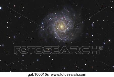 Stock Photograph - Messier 74, a face-on spiral galaxy in the constellation Pisces.. Fotosearch