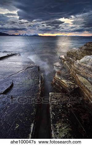 Midnight Sun over Vagsfjorden in Troms County, Norway. View Large Photo Image Stock Photograph - Midnight Sun over Vagsfjorden in Troms County, Norway.. Fotosearch