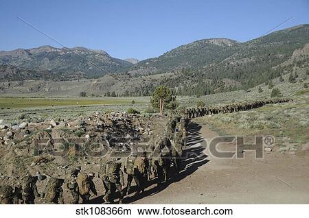Midshipmen hiking at the Mountain Warfare Training Center. View Large Photo Image Picture - Midshipmen hiking at the Mountain Warfare Training Center.. Fotosearch