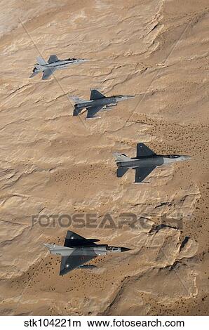 Picture - Military fighter jets fly in formation over Jordan.. Fotosearch
