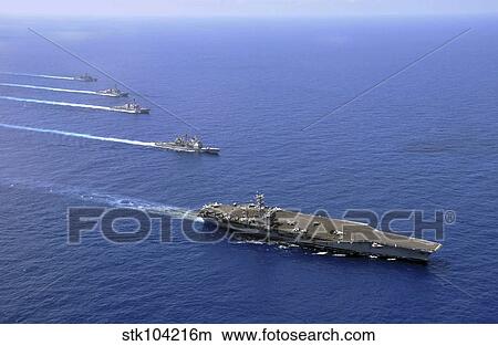 Military ships operate in formation in the South China Sea. View Large Photo Image Picture - Military ships operate in formation in the South China Sea.. Fotosearch
