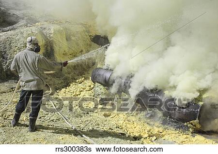 Miner cooling condensation pipes, Kawah Ijen volcano, Java, Indonesia. View Large Photo Image Stock Photograph - Miner cooling condensation pipes, Kawah Ijen volcano, Java, Indonesia.. Fotosearch