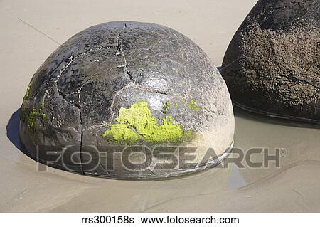 Stock Photograph - Moeraki Boulders, Koekohe Beach, New Zealand.. Fotosearch