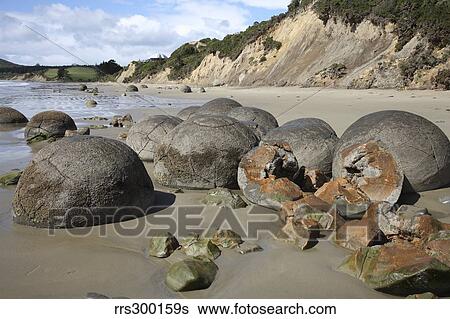 Stock Photograph - Moeraki Boulders, Koekohe Beach, New Zealand.. Fotosearch