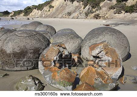 Moeraki Boulders, Koekohe Beach, New Zealand. View Large Photo Image Stock Photograph - Moeraki Boulders, Koekohe Beach, New Zealand.. Fotosearch