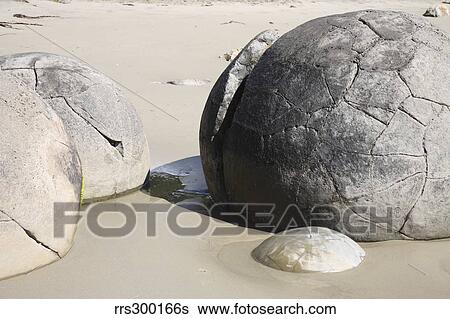 Moeraki Boulders, Koekohe Beach, New Zealand. View Large Photo Image Stock Photograph - Moeraki Boulders, Koekohe Beach, New Zealand.. Fotosearch