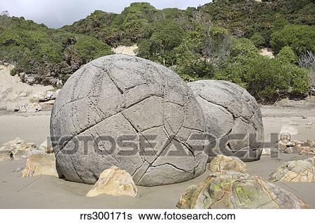 Stock Photograph - Moeraki Boulders, Koekohe Beach, New Zealand.. Fotosearch