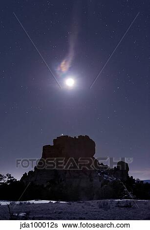Moon diffraction over Malpais Monument rock, New Mexico. View Large Photo Image Stock Photograph - Moon diffraction over Malpais Monument rock, New Mexico.. Fotosearch