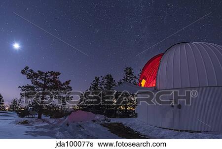Stock Photograph - Moonlight illuminates the Schulman telescope on Mount Lemmon.. Fotosearch