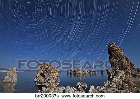 Moonlight illuminates the tufa formations at Mono Lake, California. View Large Photo Image Stock Photograph - Moonlight illuminates the tufa formations at Mono Lake, California.. Fotosearch