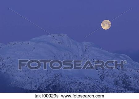Moonset at dawn. View Large Photo Image Stock Photograph - Moonset at dawn.. Fotosearch