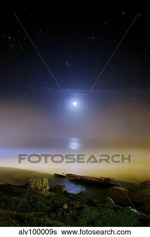 Moonset over the sea with Pleiades (M45) cluster. View Large Photo Image Stock Photograph - Moonset over the sea with Pleiades (M45) cluster.. Fotosearch