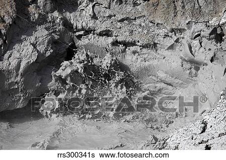 Stock Photograph - Mud volcano hot spring, Yellowstone National Park, Wyoming.. Fotosearch