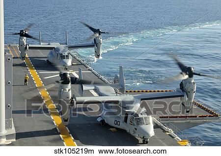 MV-22 Osprey aircraft land aboard USS Peleliu. View Large Photo Image Picture - MV-22 Osprey aircraft land aboard USS Peleliu.. Fotosearch