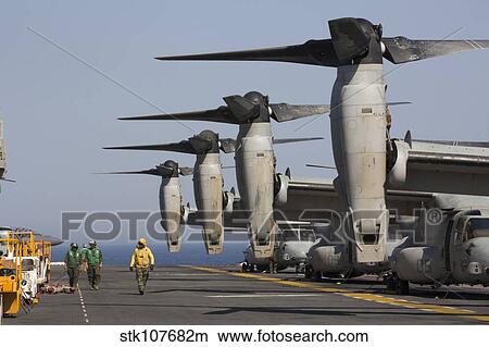 MV-22 Ospreys sit ready for launch on the flight deck of USS Kearsarge. View Large Photo Image Picture - MV-22 Ospreys sit ready for launch on the flight deck of USS Kearsarge.. Fotosearch