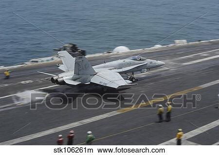 n F/A-18C Hornet launches from USS Dwight D. Eisenhower. View Large Photo Image Picture - n F/A-18C Hornet launches from USS Dwight D. Eisenhower.. Fotosearch