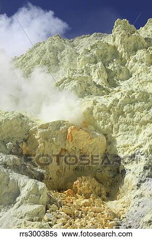Natural sulphur deposits damaged by miners, Kawah Ijen volcano, Java, Indonesia. View Large Photo Image Stock Photograph - Natural sulphur deposits damaged by miners, Kawah Ijen volcano, Java, Indonesia.. Fotosearch
