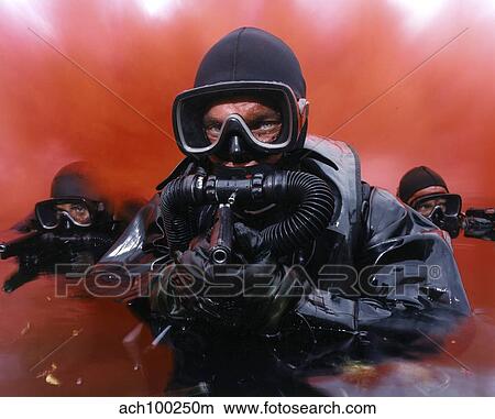 Navy divers on a training reconnaissance exercise. View Large Photo Image Picture - Navy divers on a training reconnaissance exercise.. Fotosearch