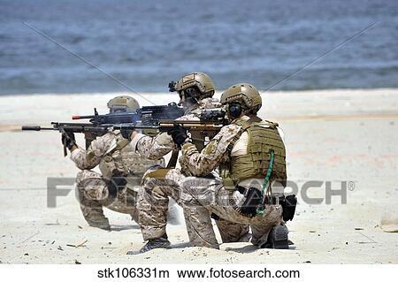 Navy SEALs participate in a capabilities exercise. View Large Photo Image Picture - Navy SEALs participate in a capabilities exercise.. Fotosearch