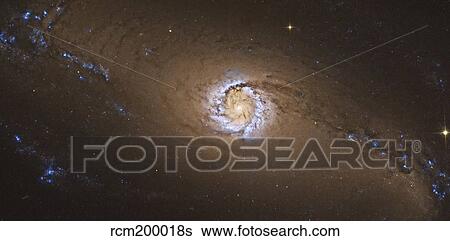 NGC 1097, a barred spiral galaxy in the constellation Fornax. View Large Photo Image Stock Photograph - NGC 1097, a barred spiral galaxy in the constellation Fornax.. Fotosearch