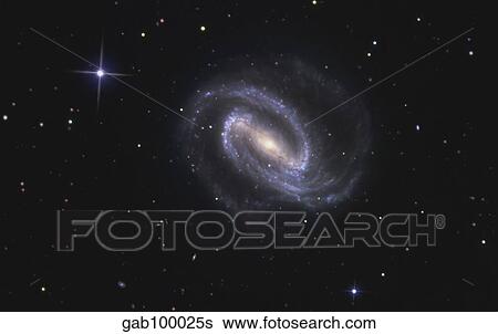 NGC 1300 is a barred spiral galaxy in the constellation Eridanus. View Large Photo Image Stock Photograph - NGC 1300 is a barred spiral galaxy in the constellation Eridanus.. Fotosearch