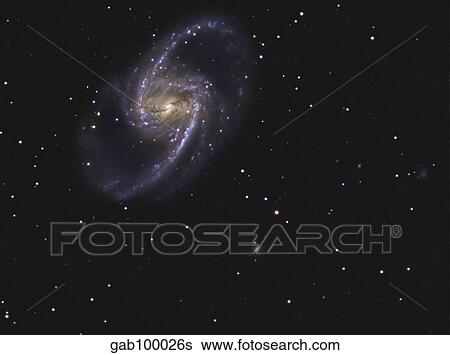 Stock Photograph - NGC 1365 is a barred spiral galaxy in the constellation Fornax.. Fotosearch