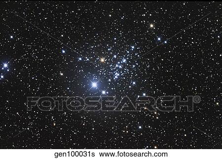 NGC 457 is an open star cluster in the constellation Cassiopeia. View Large Photo Image Stock Photograph - NGC 457 is an open star cluster in the constellation Cassiopeia.. Fotosearch