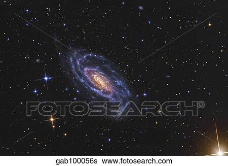 NGC 5033, a spiral galaxy situated in the constellation of Canes Venatici. View Large Photo Image Stock Photograph - NGC 5033, a spiral galaxy situated in the constellation of Canes Venatici.. Fotosearch