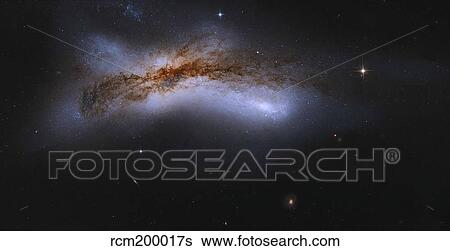 NGC 520, a pair of colliding spiral galaxies. View Large Photo Image Stock Photograph - NGC 520, a pair of colliding spiral galaxies.. Fotosearch